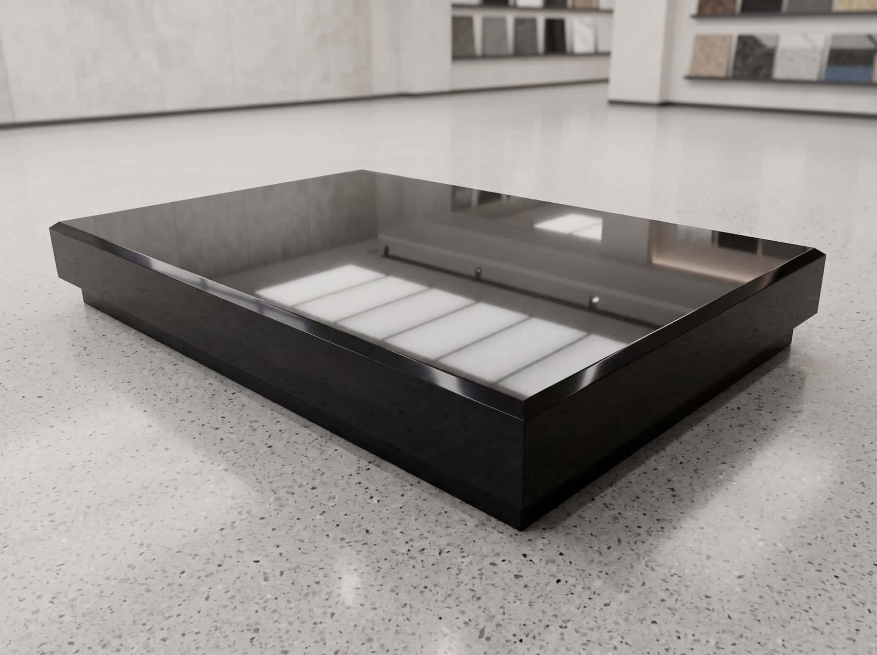Rectangular polished black granite tray with a recessed centre